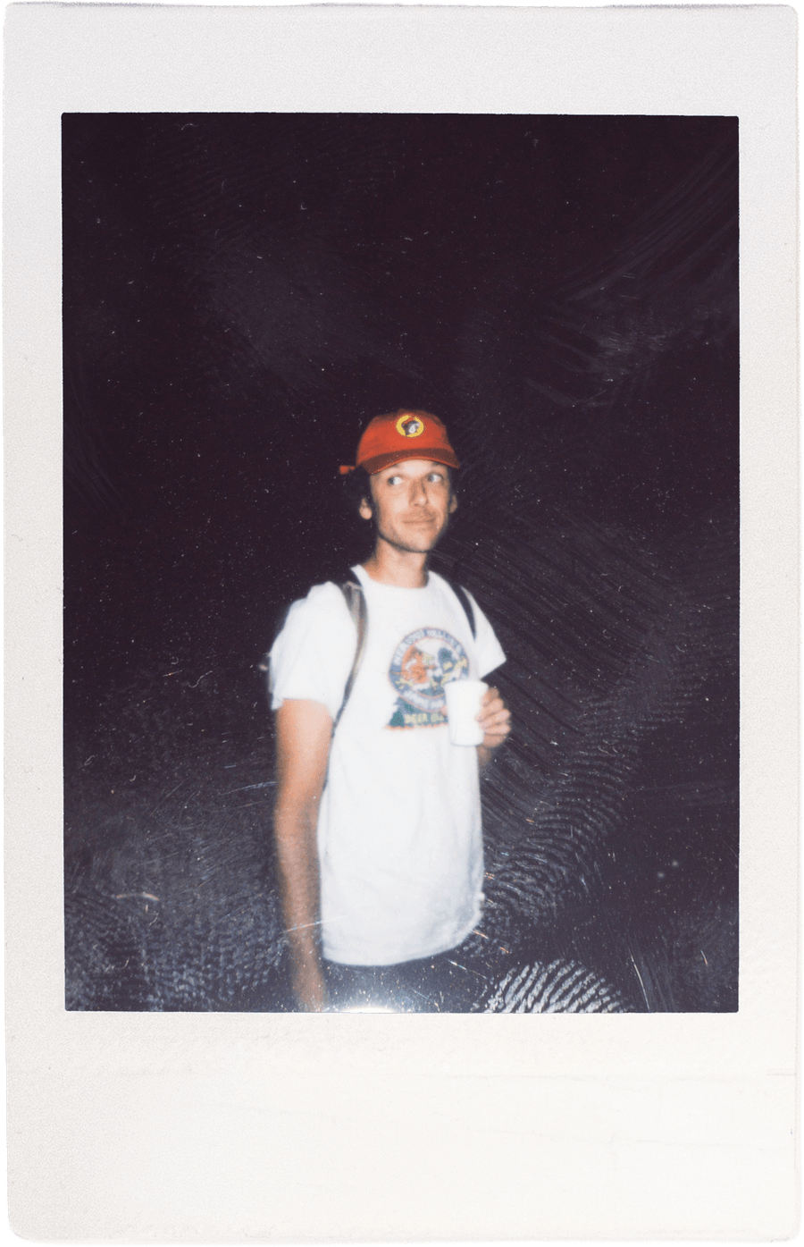 Team member in a red cap